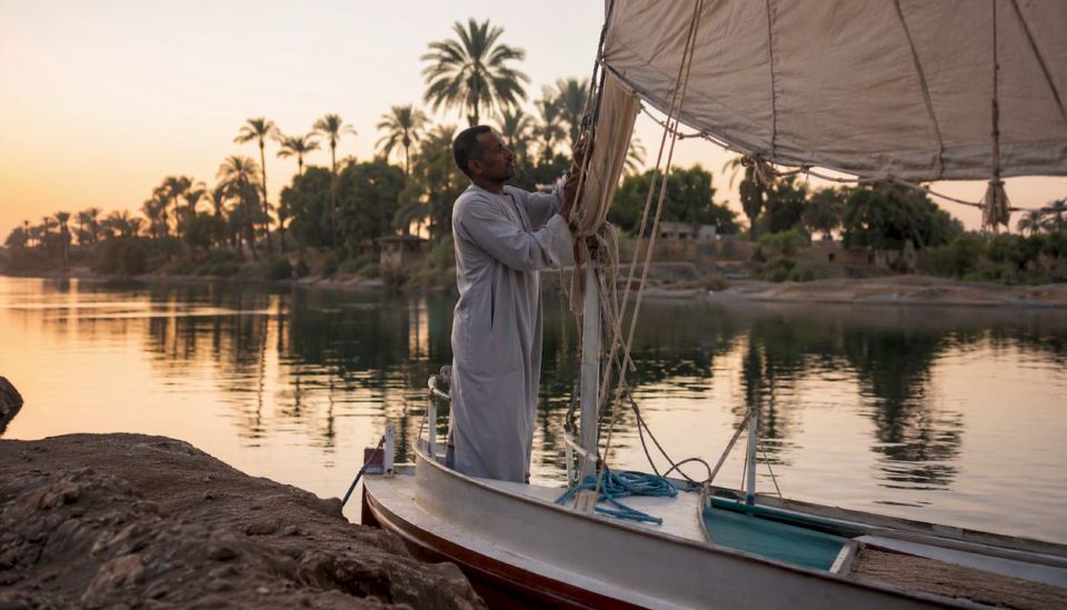 Captain adjusting sail on Nile felucca boat
