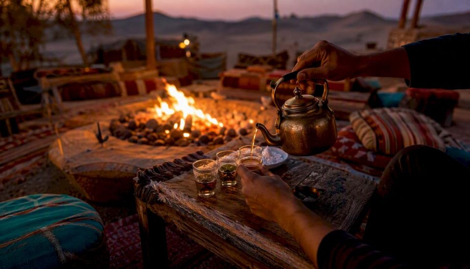Pouring mint tea at Bedouin desert camp