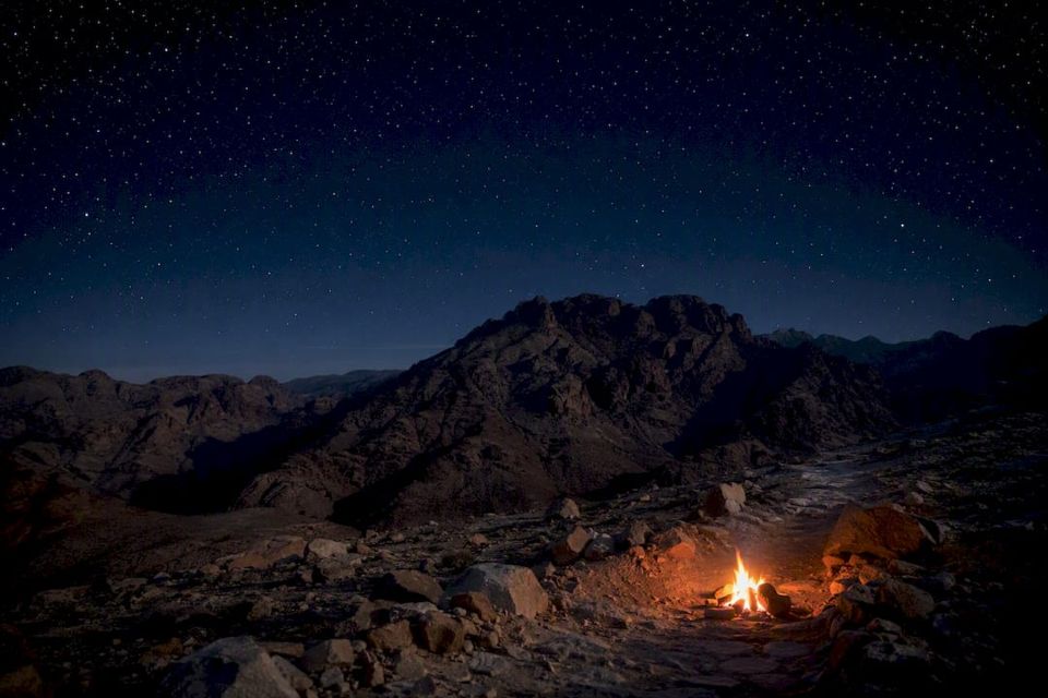 Mount Sinai rocky peak under star-filled sky