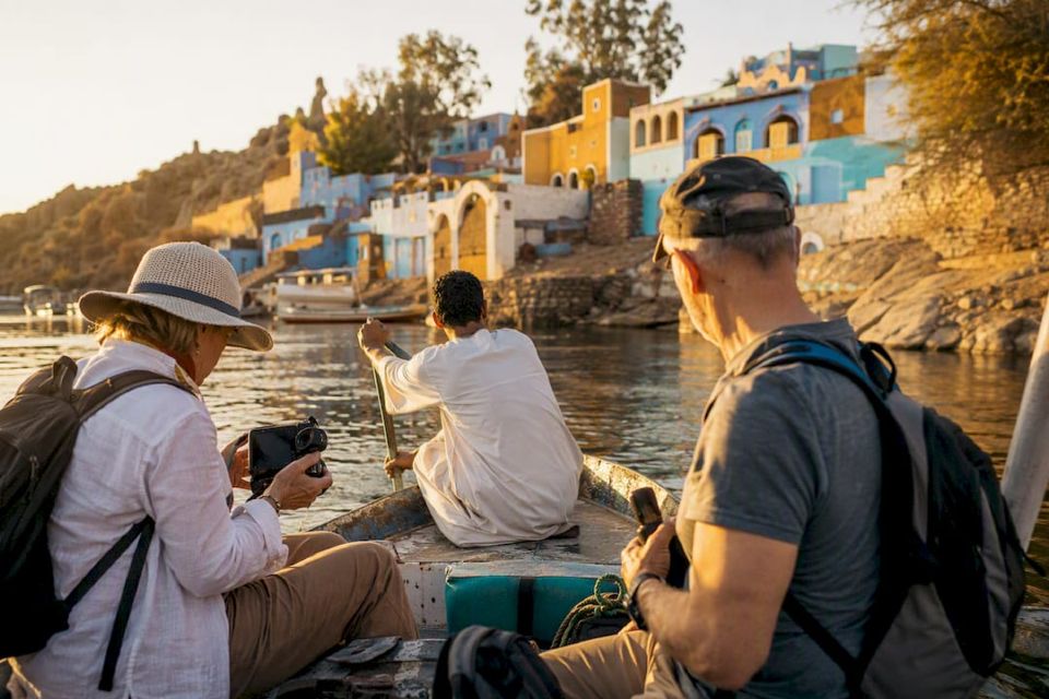 Small group rowing boat near Nubian village