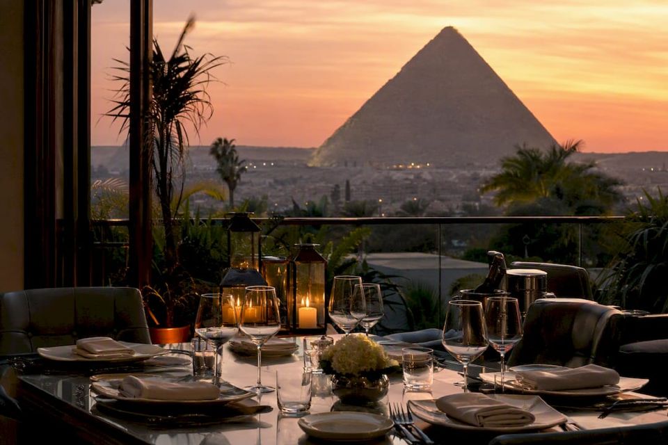 Dining terrace with Great Pyramid view at sunset